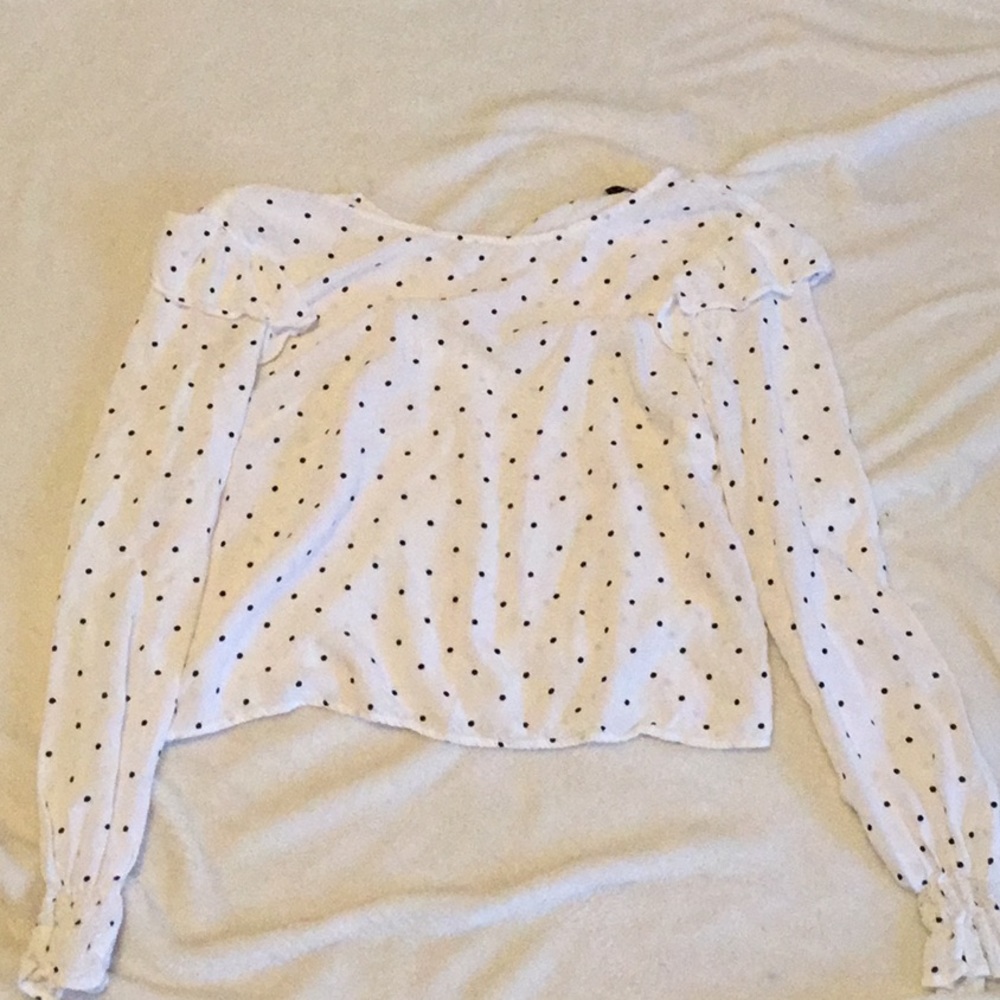 White with black polka dot blouse